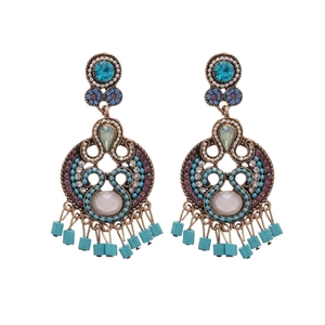 Vintage bohemian leaf tassel earrings with turquoise stones in bronze hollow design