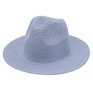 Detail of light blue straw fedora showing high-density spiral weave texture and classic crown