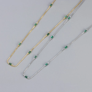 Elegant gold and silver link necklaces with rectangular emerald green zircon stones