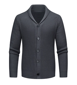 Close-up of dark grey knitted cardigan with shawl collar and textured button details