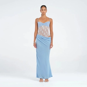 Light blue slip dress with white lace waist and sleek fabric on a studio model