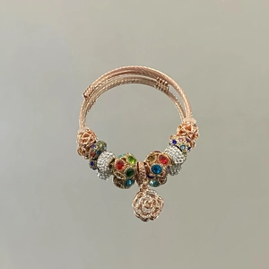 Adjustable rose gold wire bracelet with colorful crystal beads and rose pendant charm