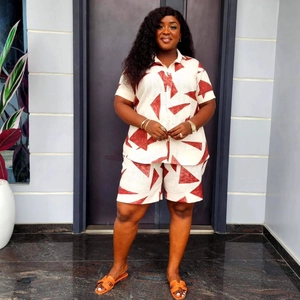 Women's plus size two-piece set featuring short sleeve printed shirt and shorts