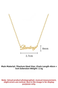 Macro view of gold titanium steel necklace with Darling script pendant and measurements