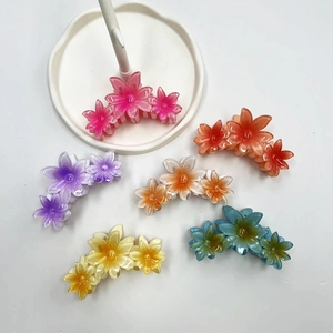 Set di sei mollette per capelli a forma di fiori di frangipane in rosa, arancio e viola
