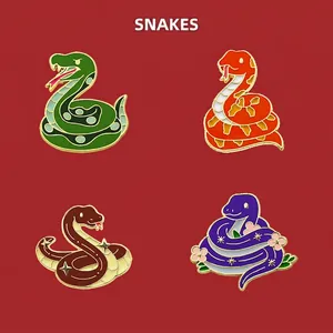 Set of four colorful 2025 Year of the Snake enamel pins with floral and star motifs
