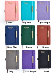 Detail view of the high-quality faux leather texture and metallic accents on these planners