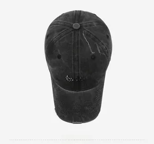 Top view of distressed washed black baseball cap with Run to the Sunset embroidery