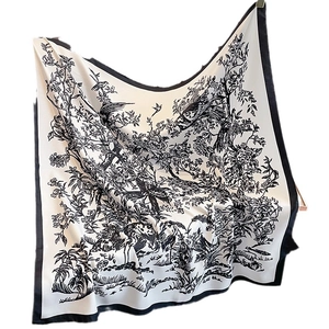 Elegant silk scarf with Chinese ink flower and bird pattern in a minimalist black frame