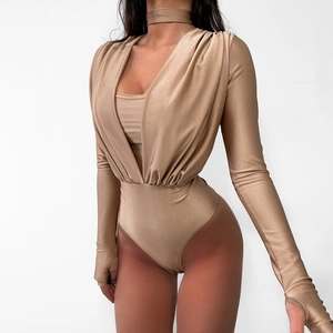 Detail of champagne long sleeve bodysuit featuring deep V-neck pleats and matching choker