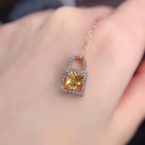 Micro-pave heart lock necklace with yellow crystal pendant in rose gold finish