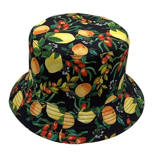 Women's reversible bucket hat with black floral and fruit print for outdoor sun protection