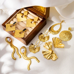 Assorted 18K gold plated hoop earrings with textured metal and pearl details