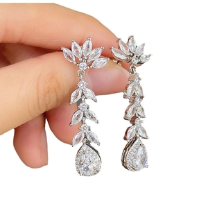 Long tassel drop earrings featuring marquise and pear shaped cubic zirconia in silver