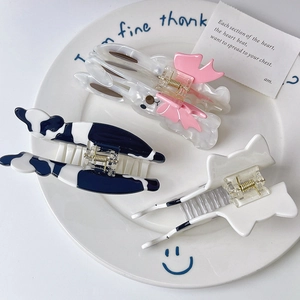 Three-piece acetate claw clip set featuring cute rabbit, cow print, and cat ear designs