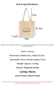 Detail view of canvas tote bag featuring magnetic buckle closure and internal zipper pocket