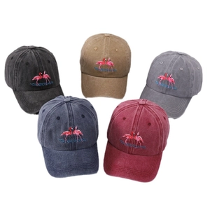 Washed cotton baseball caps with embroidered flamingo in five assorted colors