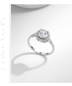 Detail of s925 sterling silver halo ring with a round brilliant-cut center stone