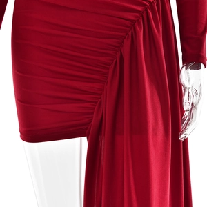 Detail of red slim fit dress showing elegant waist pleats and side draping ribbon
