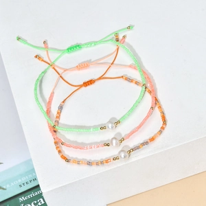 Bohemian woven seed bead bracelets set with freshwater pearls in fresh pastel colors