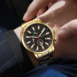 Close-up of Geneva men's gold watch with black multi-function dial and date display