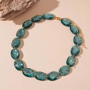 Vintage oval teal resin necklace with gold-plated chain and marble texture pattern