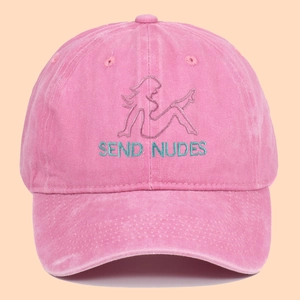 Pink washed cotton baseball cap featuring green embroidered text and graphic design