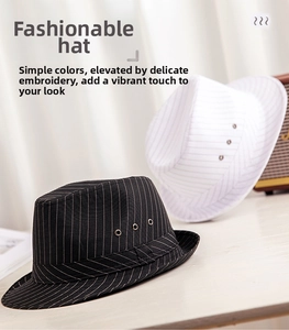Detail view of stylish fedora hats with pinstripes and metallic side vents decoration