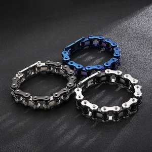 Detailed view of 18mm industrial motorcycle chain bracelets in blue, black, and silver steel