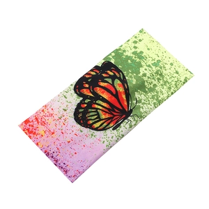 Floral butterfly printed sweatband with vibrant pink and yellow gradient for fitness yoga