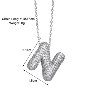 Macro view showing dimensions and weight of silver-plated 'N' letter pendant with zircons