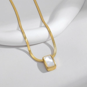 Minimalist 18K gold plated necklace with rectangular white shell pendant on a snake chain