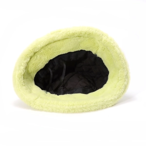 Detail view of the plush faux fur bucket hat featuring a quilted lining and adjustable drawstring