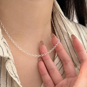 Elegant 925 sterling silver necklace featuring continuous hollow heart shaped links for women