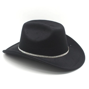 Detail of black felt cowboy hat featuring a silver rhinestone band and upturned brim