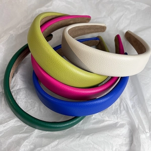 Litchi pattern leather headbands in vibrant colors with non-slip suede lining