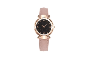Detail of starry sky dial watch with faceted glass and rose gold case on pink leather strap