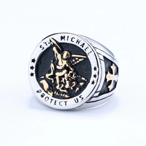 Men's two-tone St. Michael signet ring in silver and gold stainless steel on white back