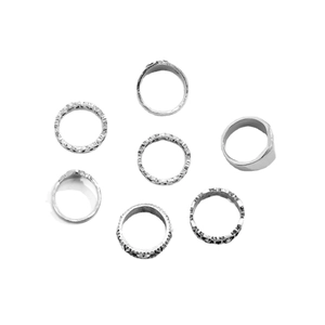 7-piece vintage silver metal ring set featuring geometric hollow and engraved textures