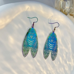 Detailed macro view of iridescent cicada wing earrings with hollow gradient texture