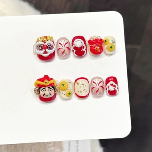 Handmade red and gold 3D lion dance press-on nails with lucky god and fortune bag decor