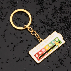 Macro shot of sliding lightning bolt on My Social Battery creative metal keychain