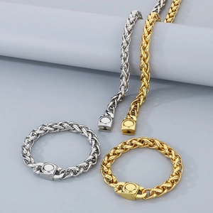 Detail view of 10mm stainless steel basket weave chains in silver and gold with magnetic clasps