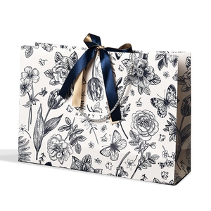 Elegant floral gift paper bag with Happy Time text and luxury dark blue ribbon bow