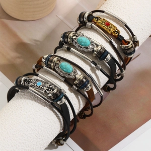 Vintage multilayer leather bracelets for men featuring turquoise stones and silver beads