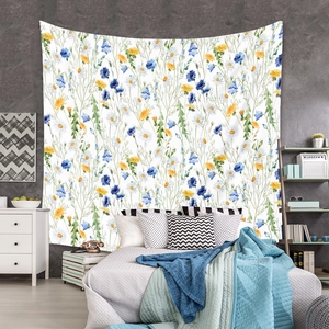 Detail view of Bohemian tapestry with hand-painted floral watercolor patterns in bedroom setting