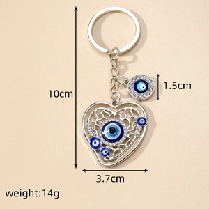 Detailed size specifications of heart-shaped evil eye keychain with blue rhinestones