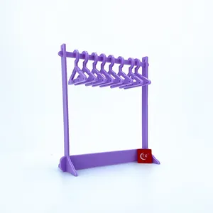 Purple acrylic jewelry display stand with eight mini coat hangers for earrings