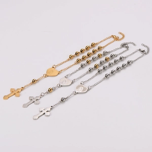 Religious stainless steel rosary bracelet with heart-shaped saint medal and cross charms