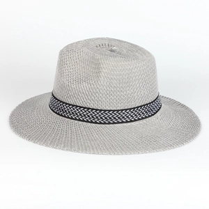 Detail of grey knitted sun hat showing the geometric black and white decorative band